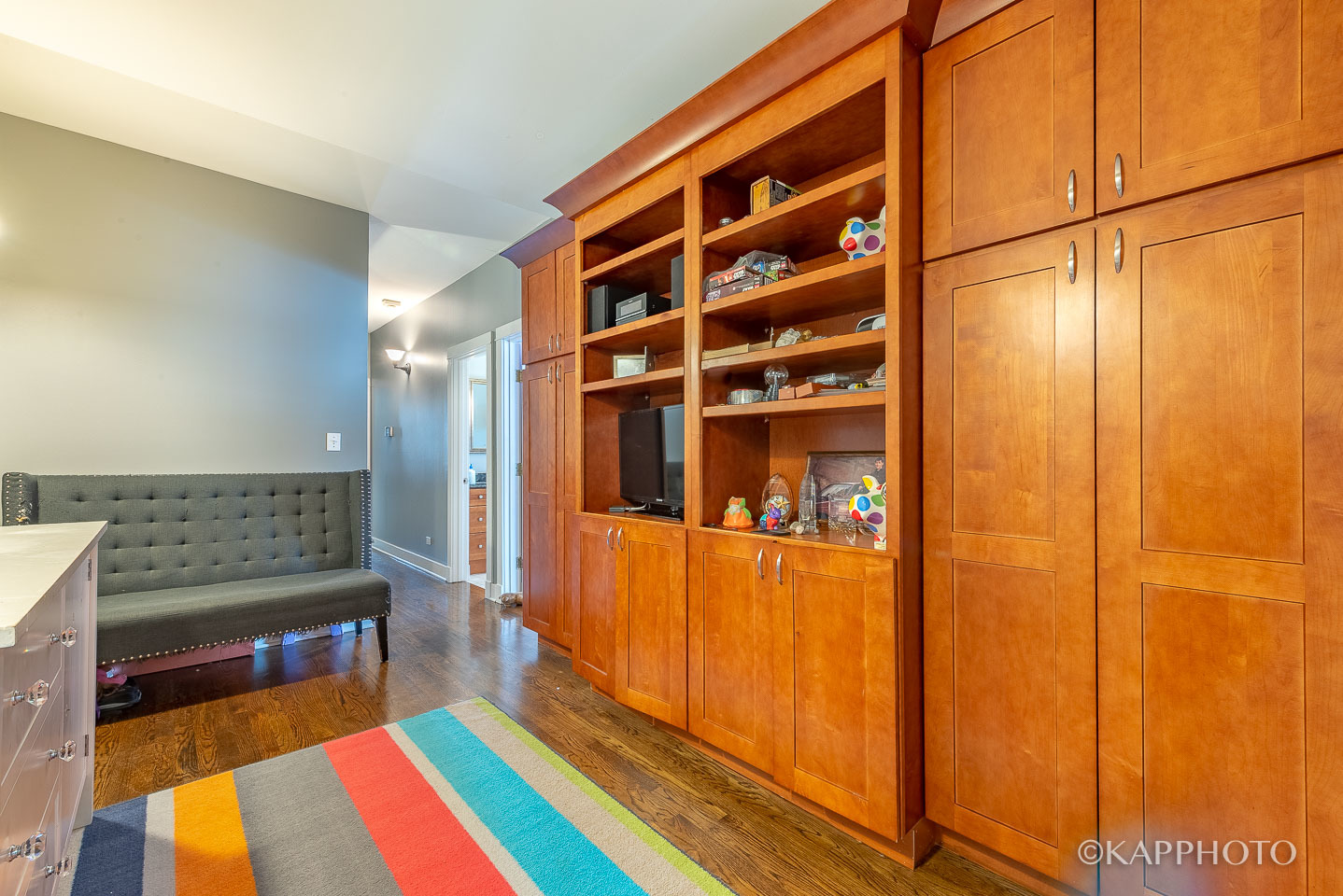 1 North Bishop Street, Unit 15 Chicago, IL 60607 - Photo 17 of 25 a bedroom with a bed and a dresser