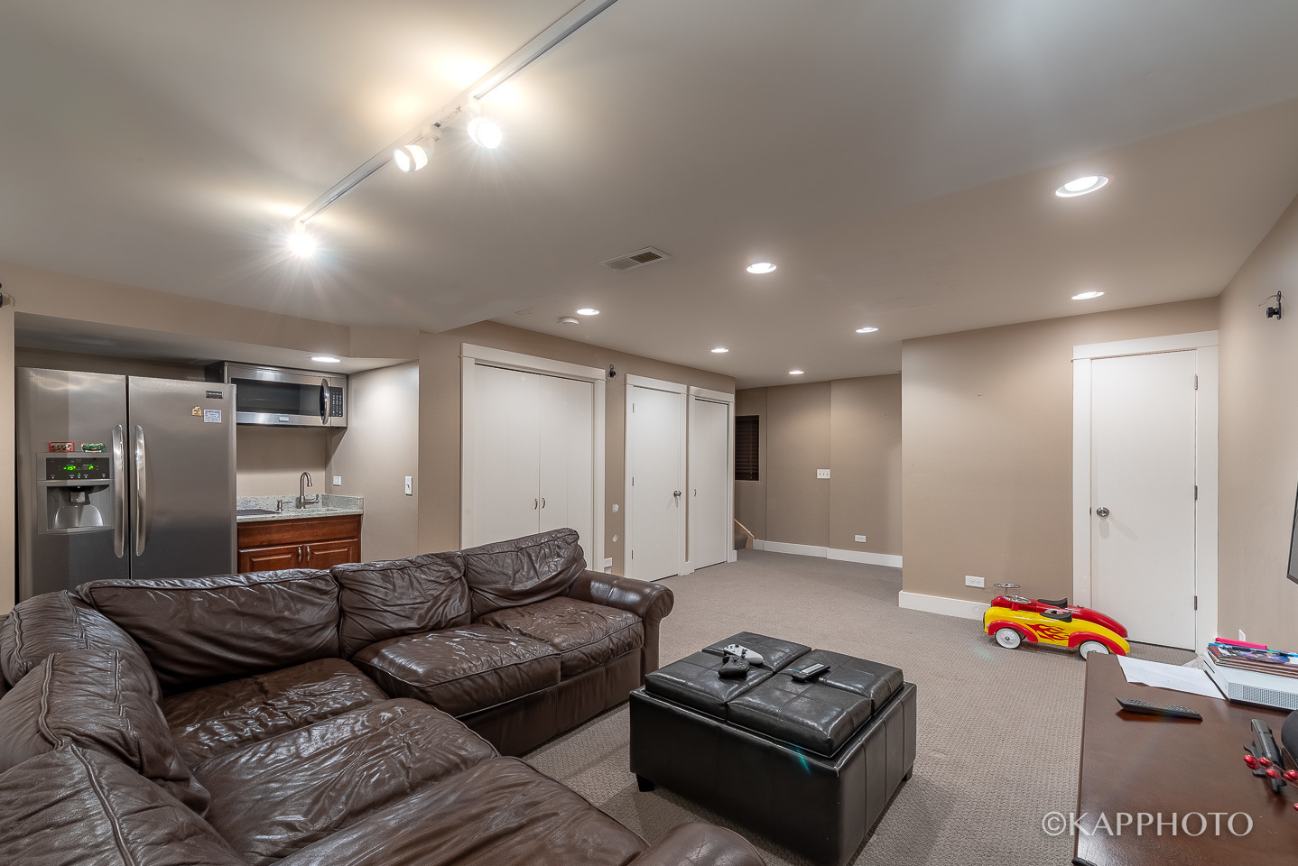 1 North Bishop Street, Unit 15 Chicago, IL 60607 - Photo 19 of 25 a living room with furniture and a wooden floor