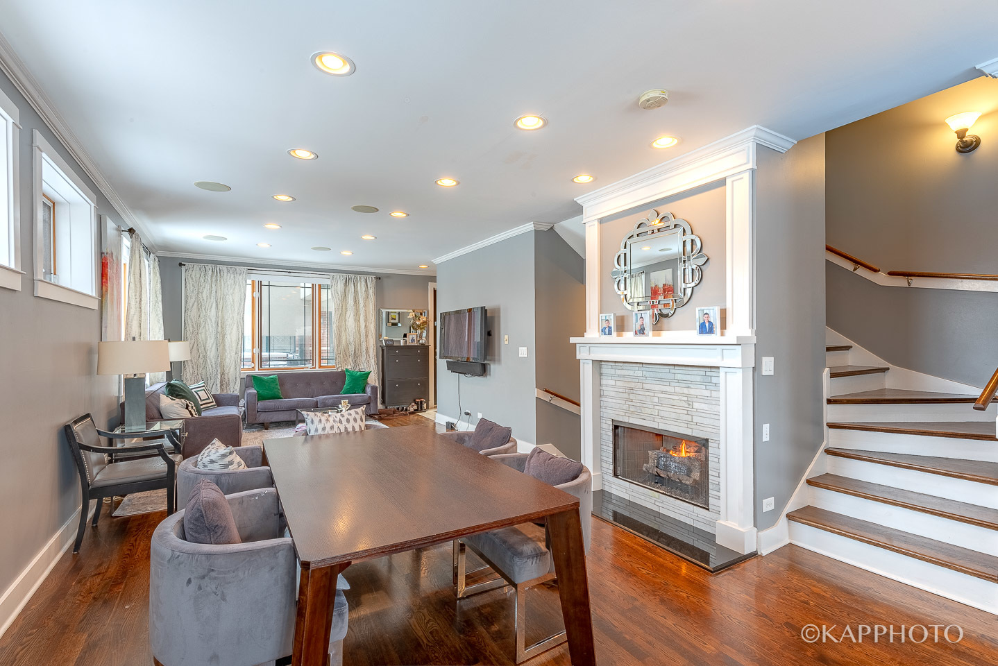 1 North Bishop Street, Unit 15 Chicago, IL 60607 - Photo 6 of 25 a living room with furniture a fireplace and a flat screen tv
