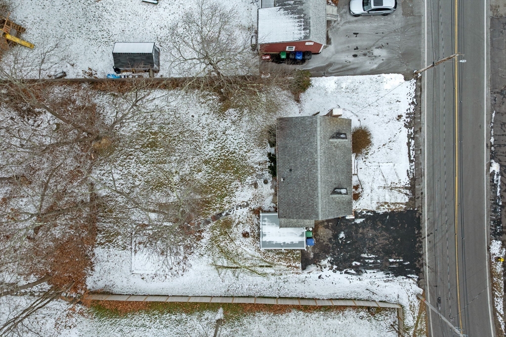 98 John Carver Road Reading, MA 01867 - Photo 34 of 40 a view of a house with a yard