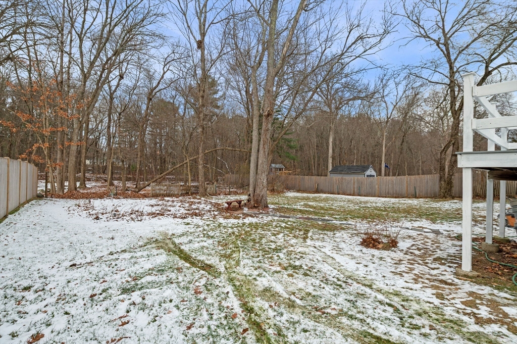 98 John Carver Road Reading, MA 01867 - Photo 37 of 40 a view of a backyard of snow