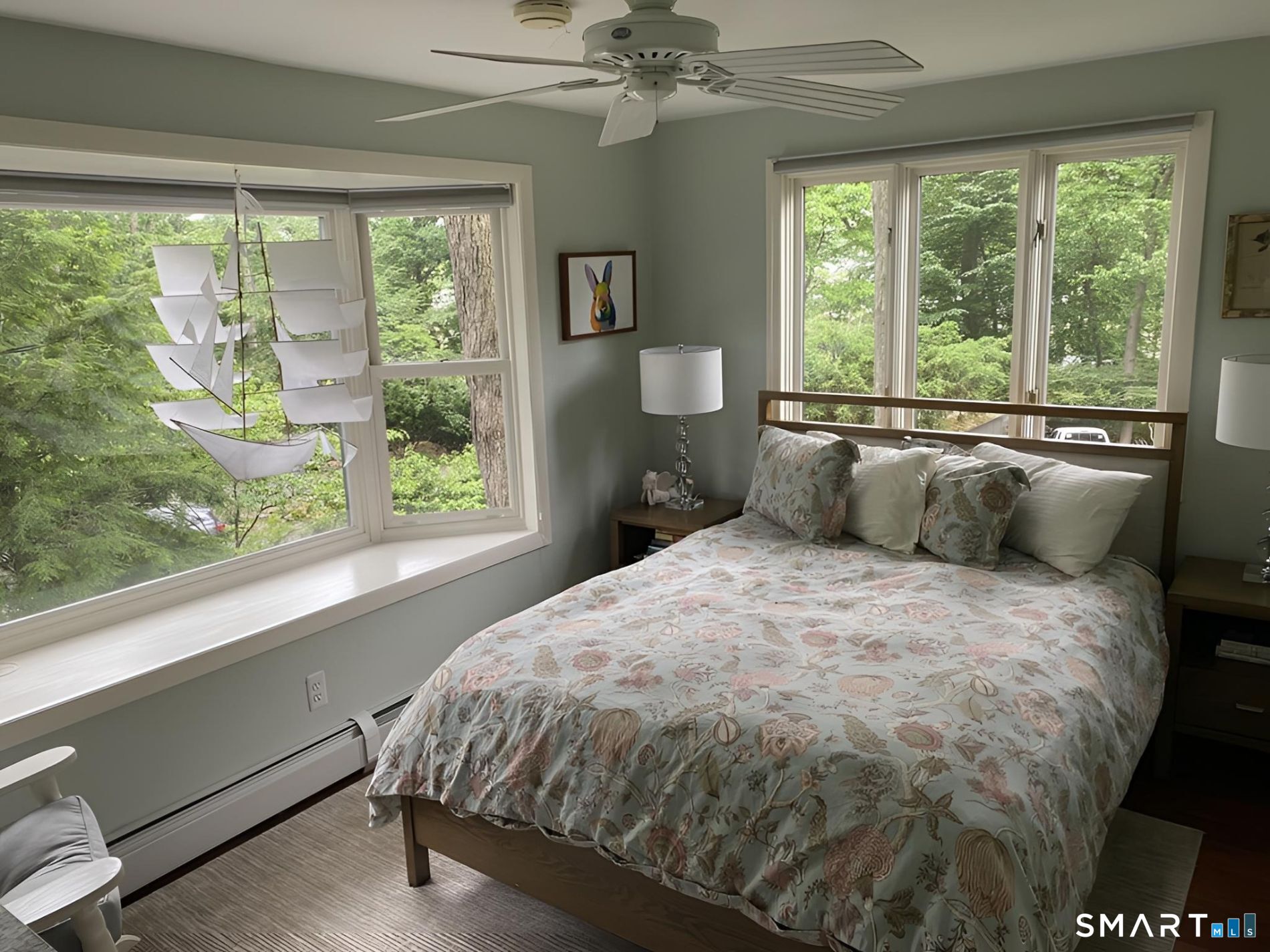 31 Splitrock Road Norwalk, CT 06854 - Photo 30 of 38 a bed sitting in a bedroom next to a window