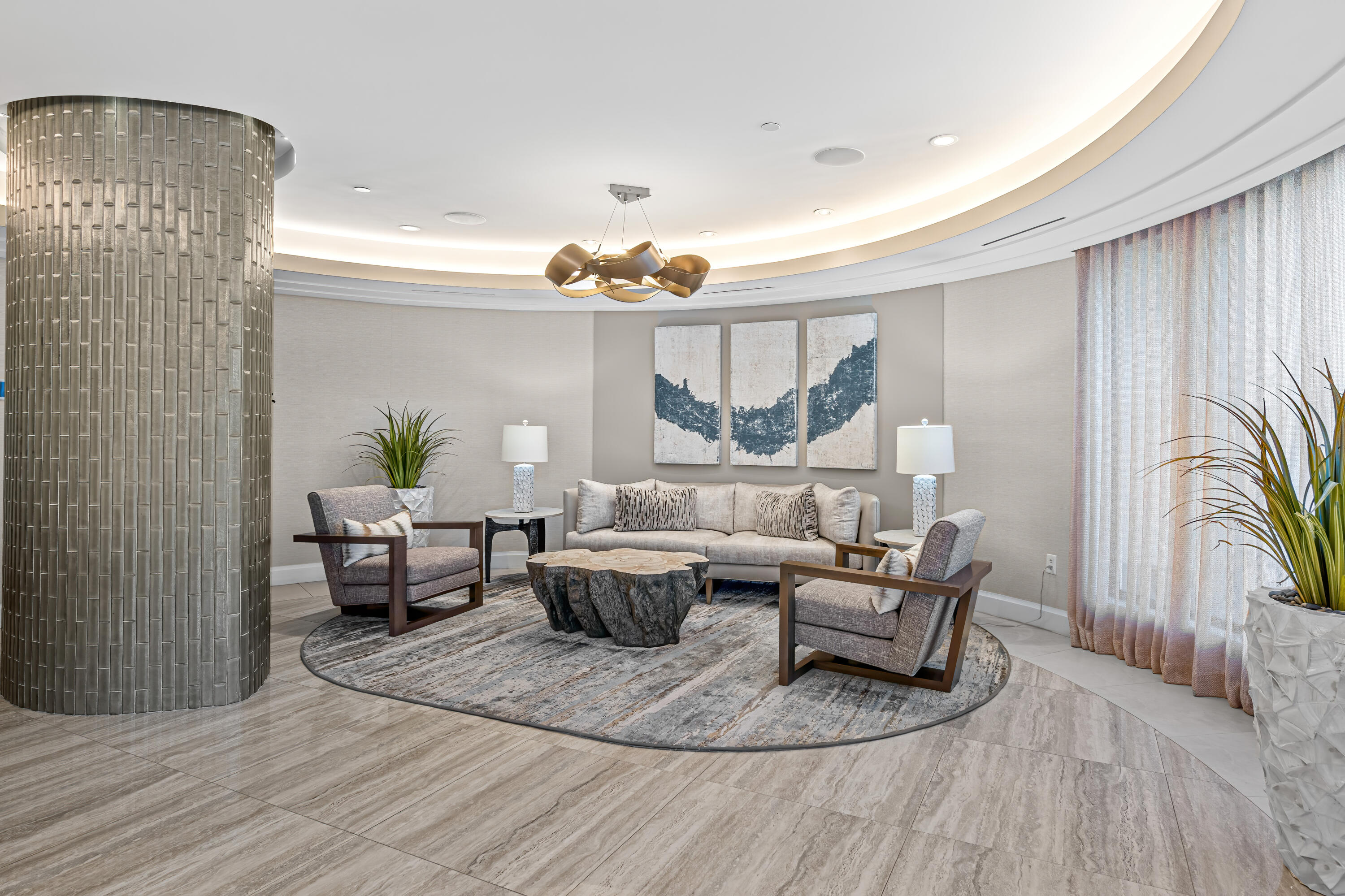 250 South Ocean Boulevard, Unit 4F Boca Raton, FL 33432 - Photo 39 of 45 a living room with furniture and a table