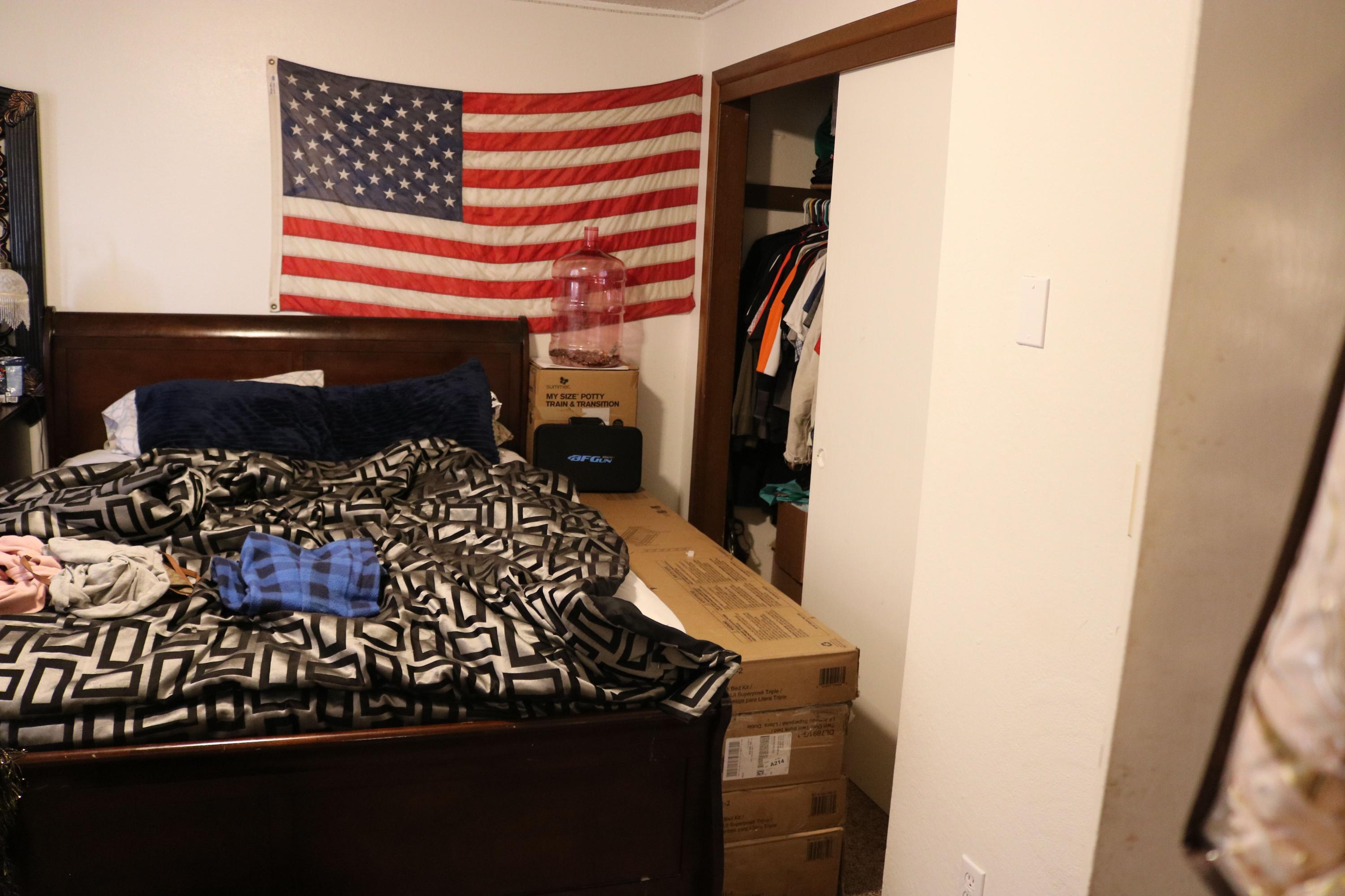 2180 Crestbrook Road Medford, OR 97504 - Photo 7 of 10 a bedroom with a bed and a window