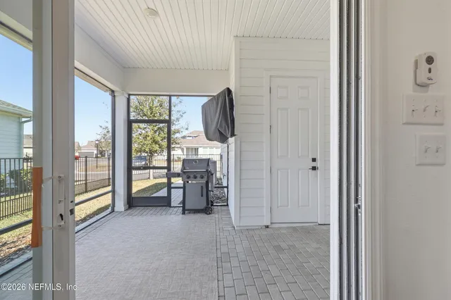 an aerial view of house with yard swimming pool and outdoor seating