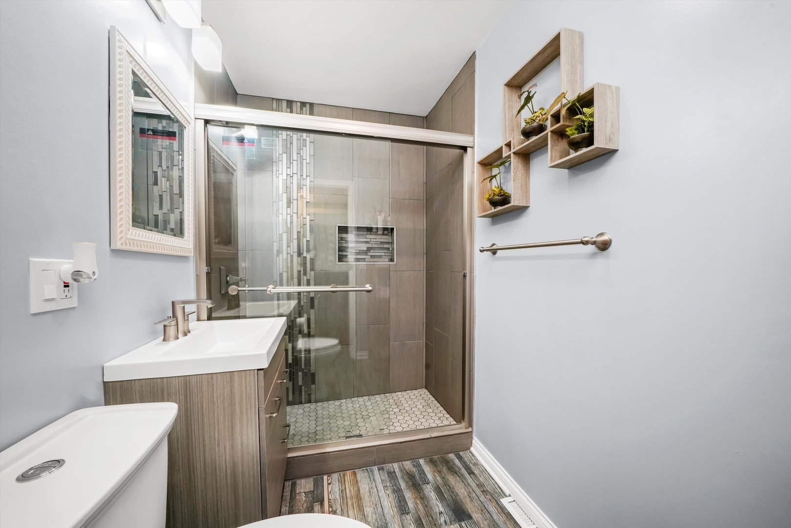 1106 Arthur Avenue Berkeley, IL 60163 - Photo 12 of 28 a bathroom with a sink toilet and shower