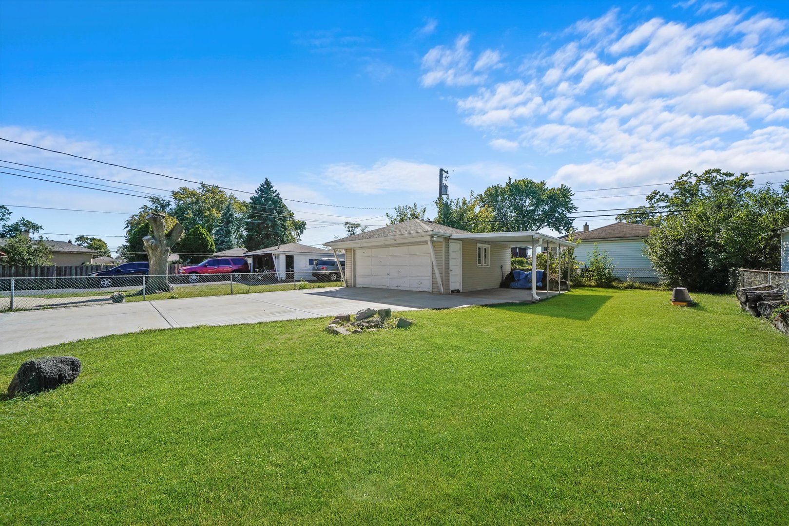 1106 Arthur Avenue Berkeley, IL 60163 - Photo 22 of 28 a view of a house with a backyard porch and sitting area