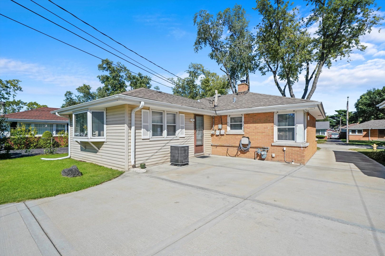 1106 Arthur Avenue Berkeley, IL 60163 - Photo 23 of 28 a house view with a sitting space and garden