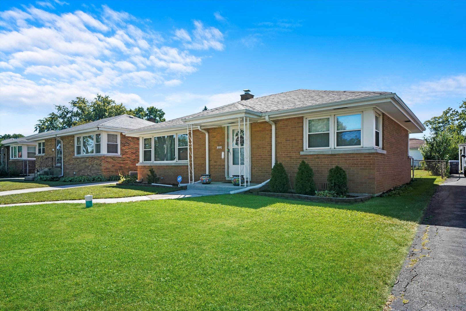 1106 Arthur Avenue Berkeley, IL 60163 - Photo 3 of 28 a backyard of a house with barbeque oven table and chairs