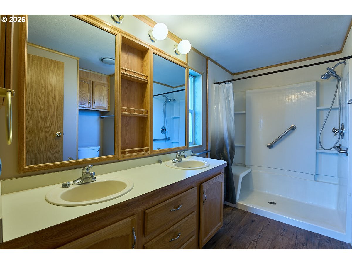 801 Residence Street Enterprise, OR 97828 - Photo 15 of 20 a bathroom with a sink and a mirror