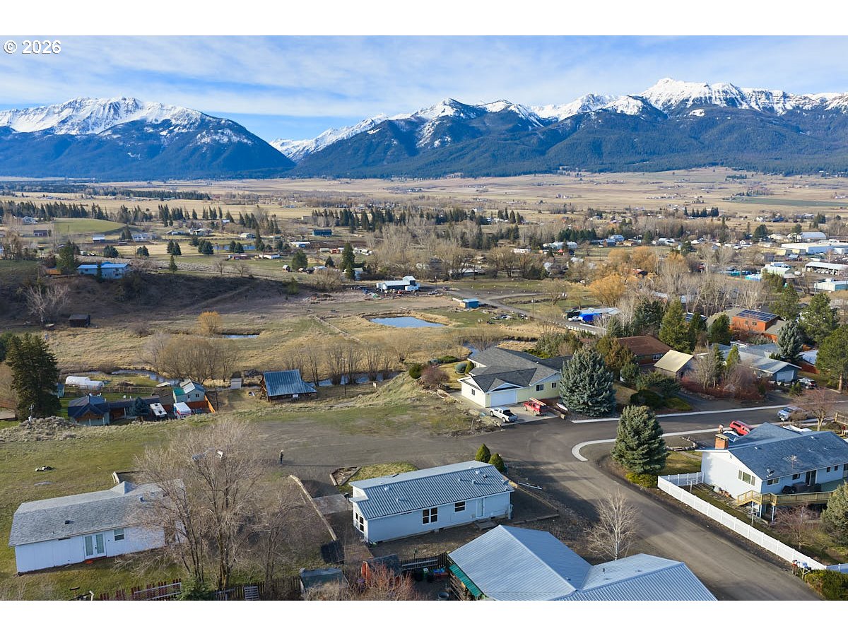801 Residence Street Enterprise, OR 97828 - Photo 2 of 20 an aerial view of residential houses with outdoor space
