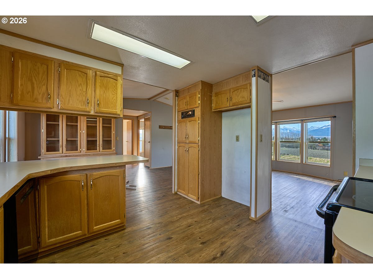 801 Residence Street Enterprise, OR 97828 - Photo 7 of 20 a view interior of a house wooden floor windows and wooden floor