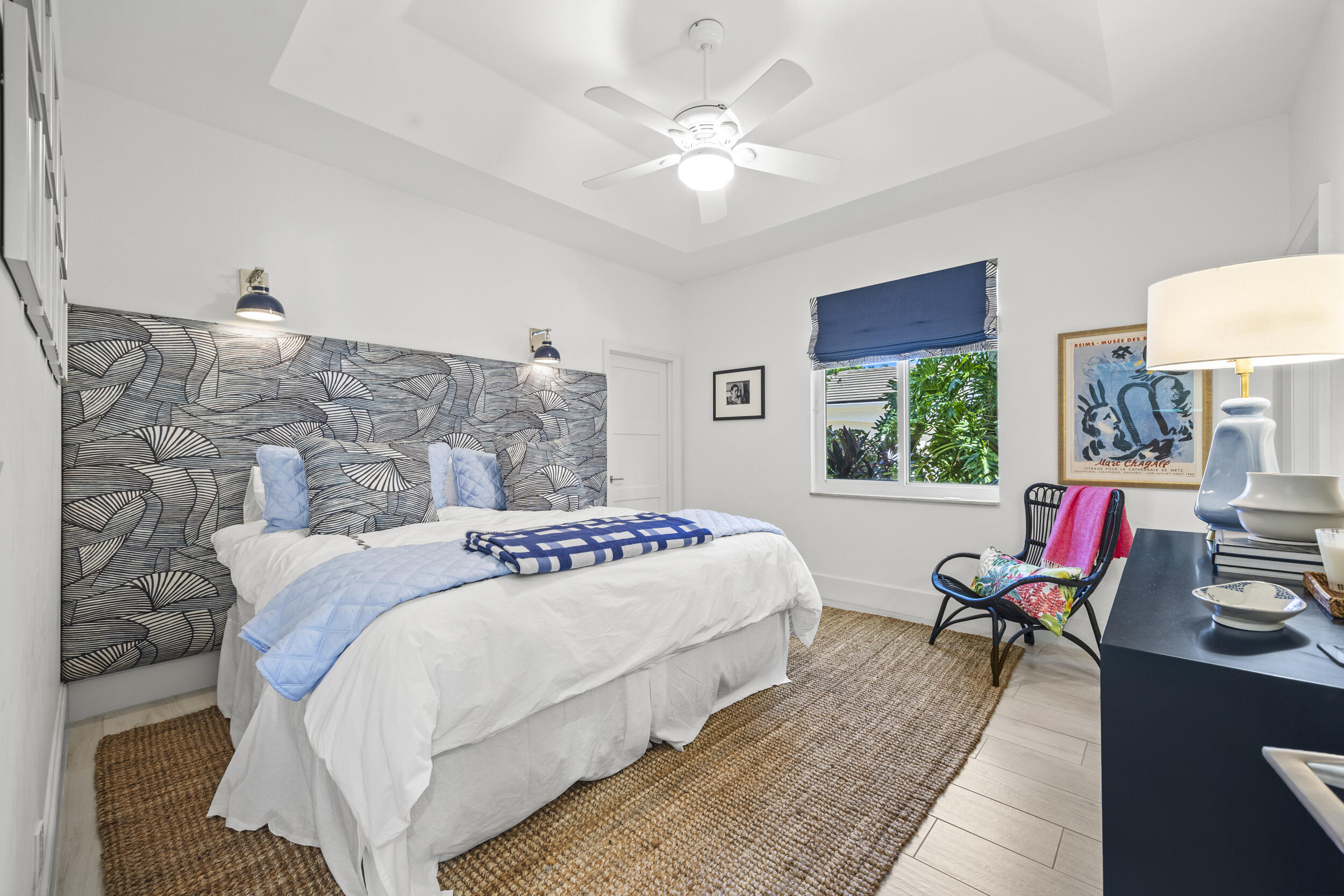 118 North Village Way Jupiter, FL 33458 - Photo 13 of 28 a bedroom with a bed wooden floor and window