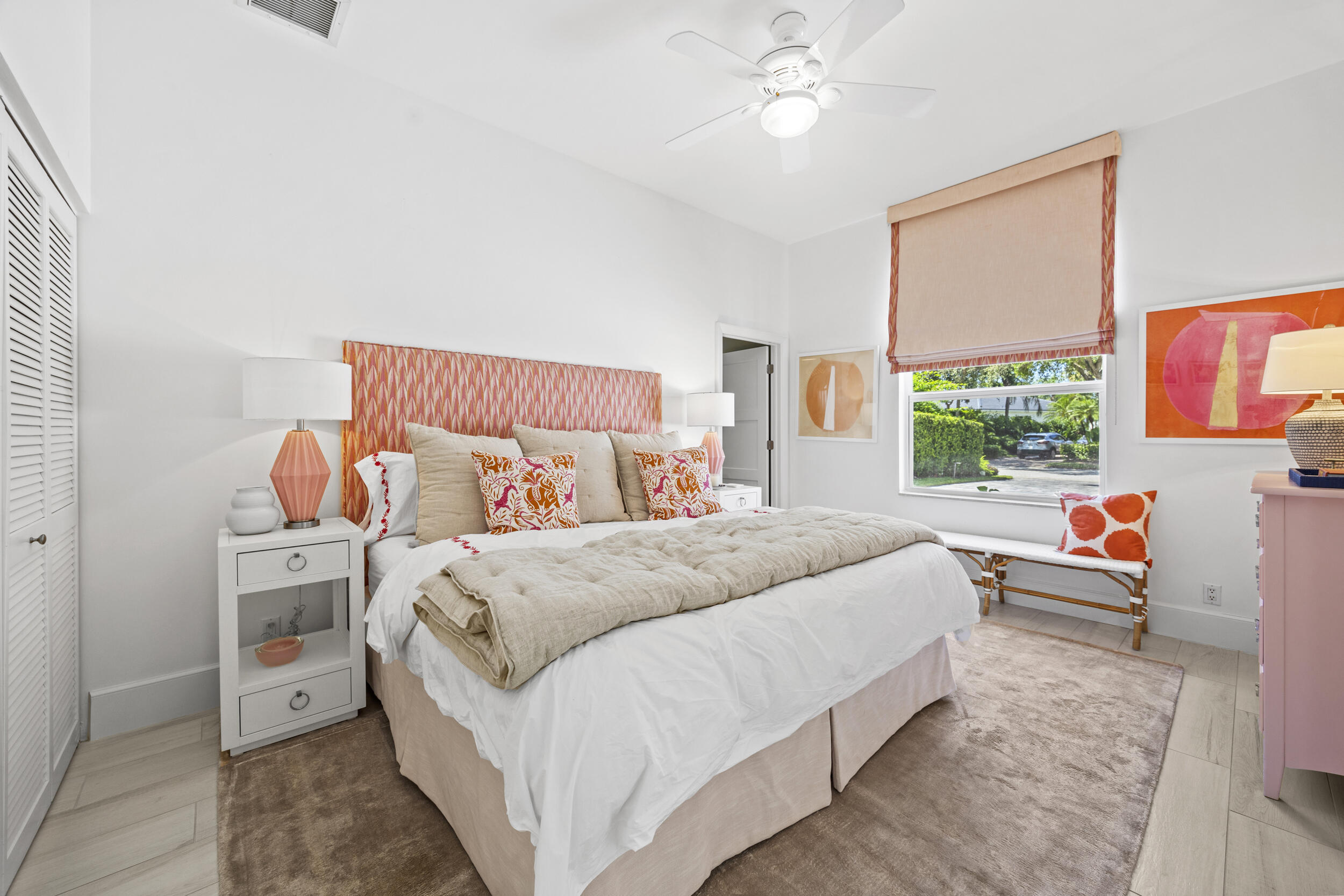 118 North Village Way Jupiter, FL 33458 - Photo 15 of 28 a bedroom with bed and window