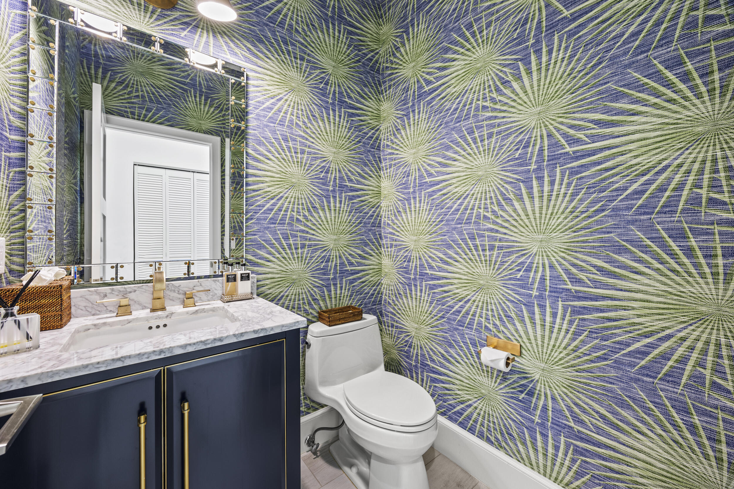 118 North Village Way Jupiter, FL 33458 - Photo 17 of 28 a bathroom with a sink a toilet and mirror