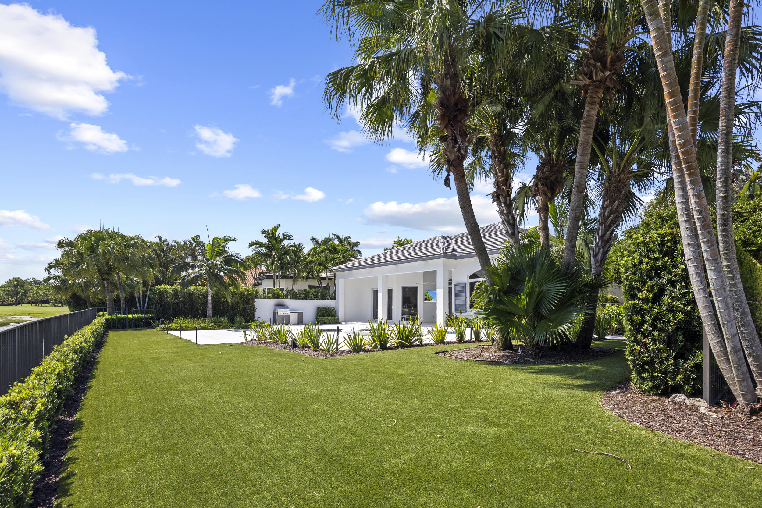 118 North Village Way Jupiter, FL 33458 - Photo 24 of 28 a view of a house with a big yard