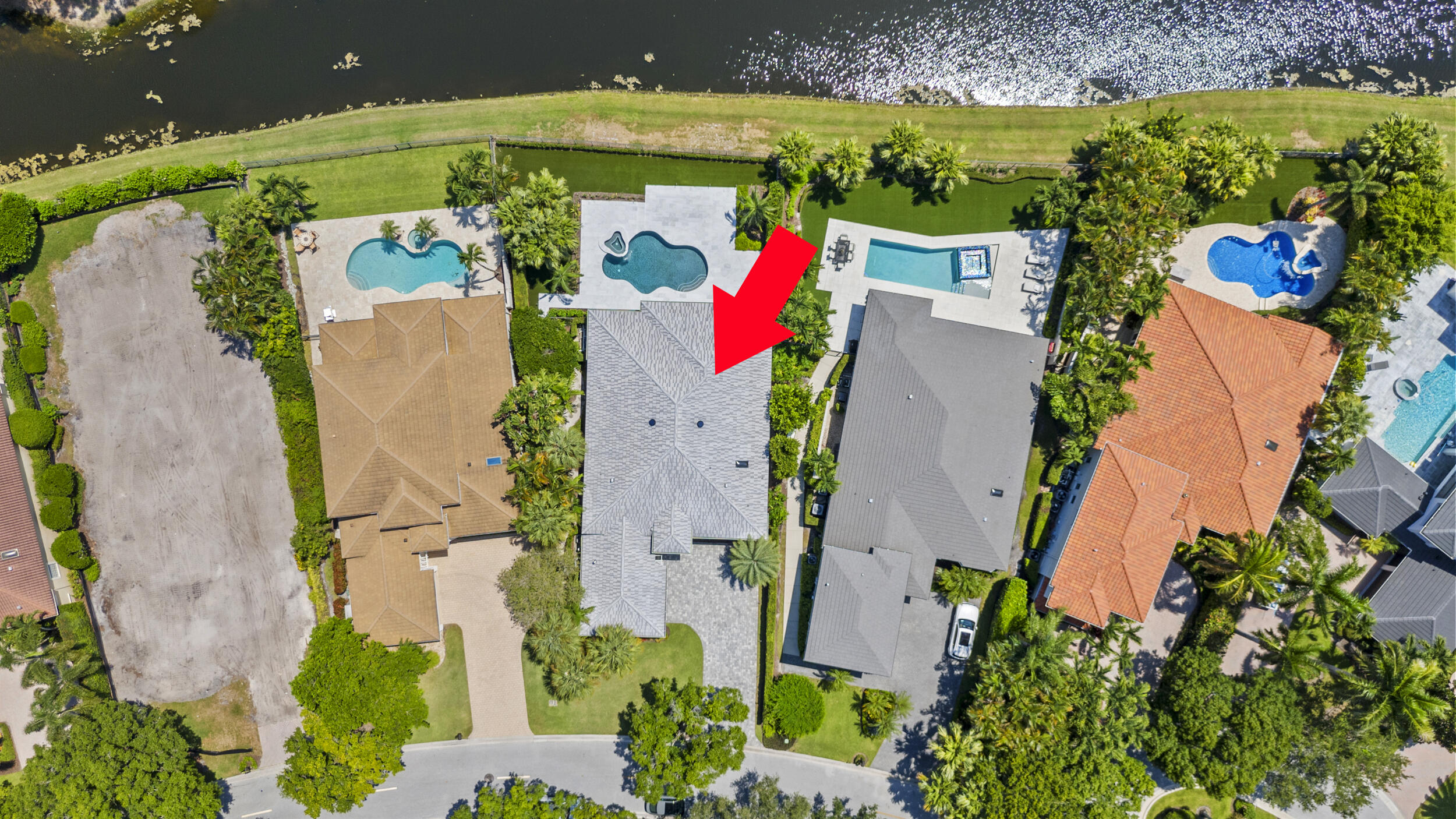 118 North Village Way Jupiter, FL 33458 - Photo 27 of 28 an aerial view of a house with a yard and seating space