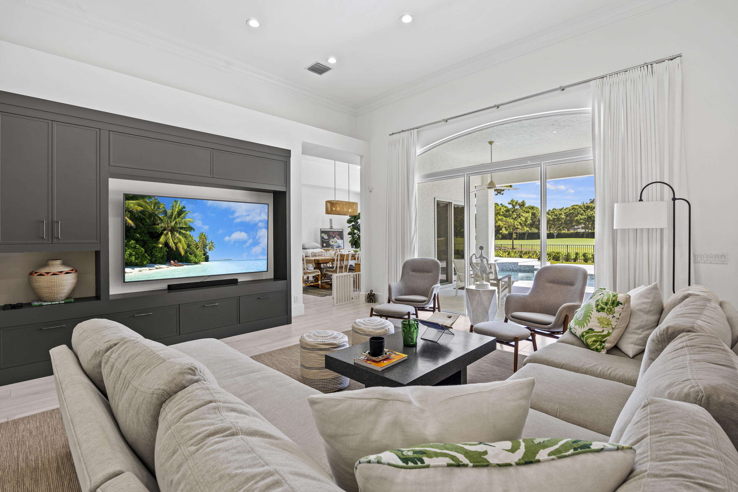 118 North Village Way Jupiter, FL 33458 - Photo 4 of 28 a living room with furniture and a large window