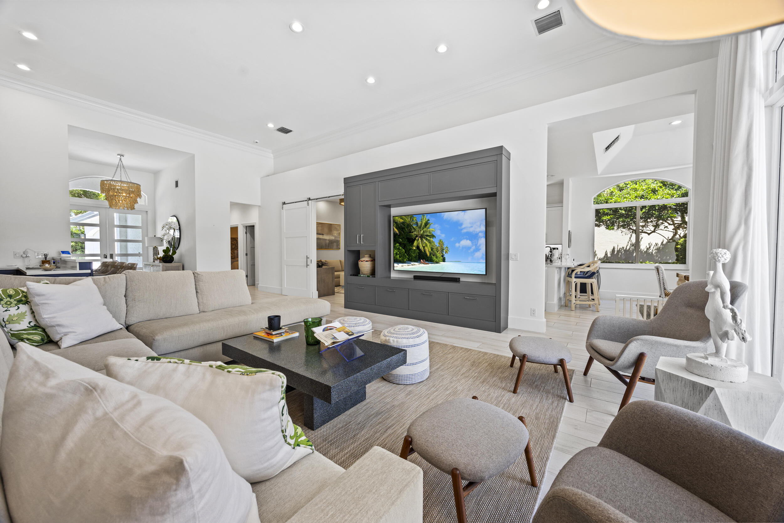 118 North Village Way Jupiter, FL 33458 - Photo 5 of 28 a living room with furniture and a large window
