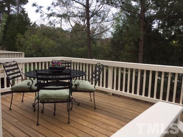 9525 Vira Drive Raleigh, NC 27617 - Photo 13 of 13 a view of balcony with wooden floor and seating space