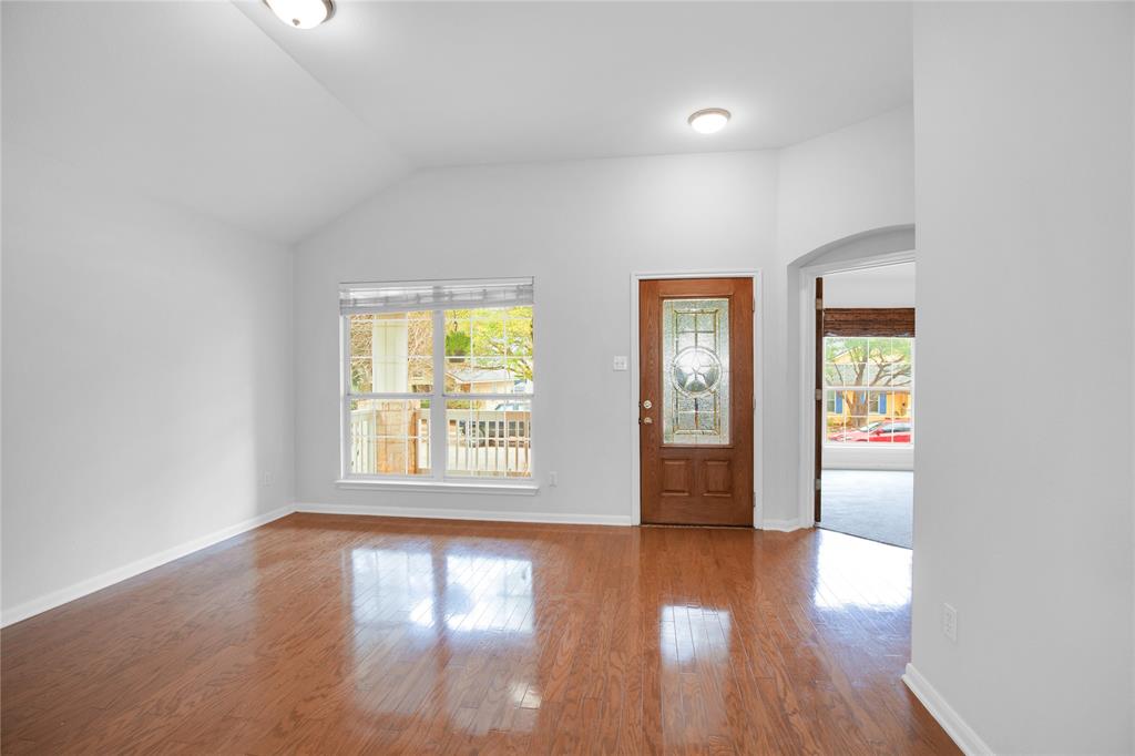 281 Hutton Kyle, TX 78640 - Photo 8 of 37 Rich hardwood flooring leads to an inviting entry, perfect for welcoming guests.