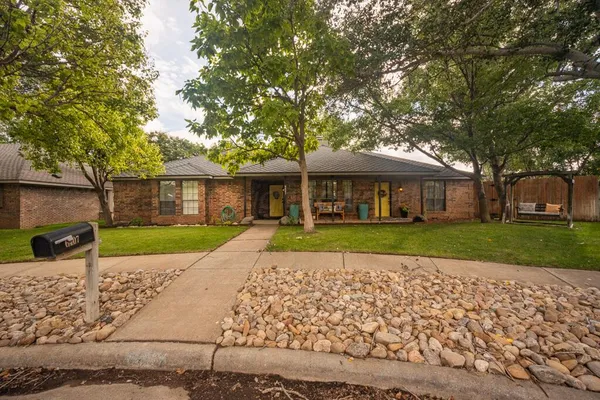 a front view of house with yard