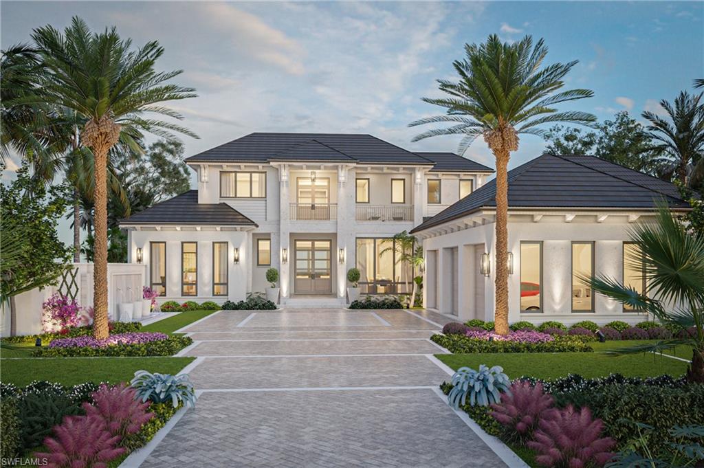 3880 Rum Row Naples, FL 34102 - Photo 1 of 6 a front view of a house with a garden
