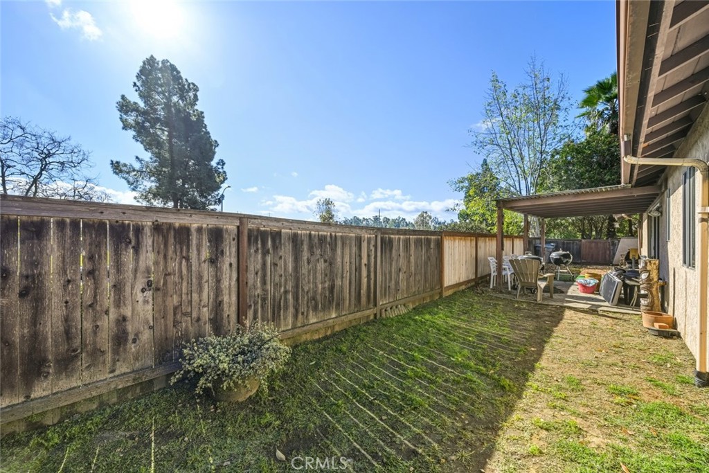 2202 Village Road Escondido, CA 92026 - Photo 13 of 15 a view of a backyard with pathway