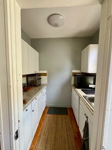 a bed room with furniture and a window