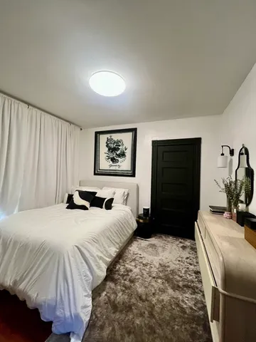 a car parked in front of a house