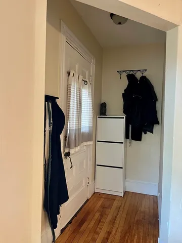 a kitchen with a sink cabinets and a stove top oven