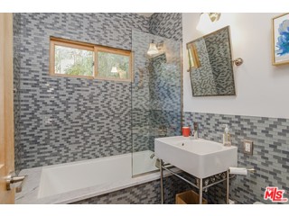 433 Sycamore Road Santa Monica, CA 90402 - Photo 14 of 28 a bathroom with a sink and a mirror