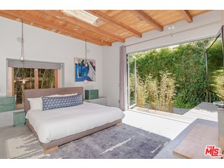 433 Sycamore Road Santa Monica, CA 90402 - Photo 15 of 28 a living room with furniture and a large window