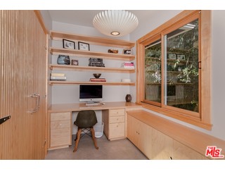433 Sycamore Road Santa Monica, CA 90402 - Photo 18 of 28 a kitchen view with white cabinets and outdoor space