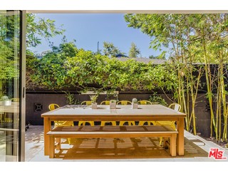 433 Sycamore Road Santa Monica, CA 90402 - Photo 8 of 28 a view of building with yard