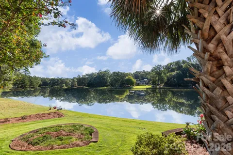 a view of a lake with a big yard