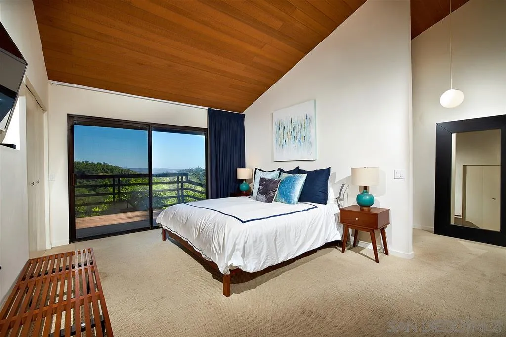 2255 Country Road Fallbrook, CA 92028 - Photo 9 of 24 a bedroom with a bed and a large window