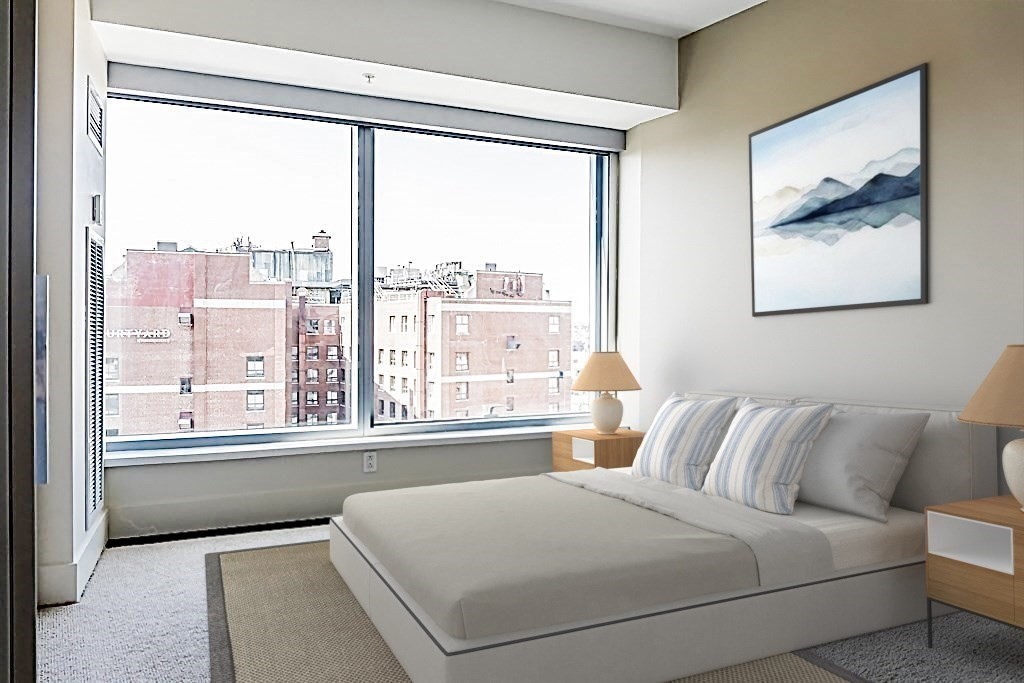 110 Stuart Street, Unit 16H Boston, MA 02116 - Photo 10 of 18 a bedroom with a bed and a large window with the outer view