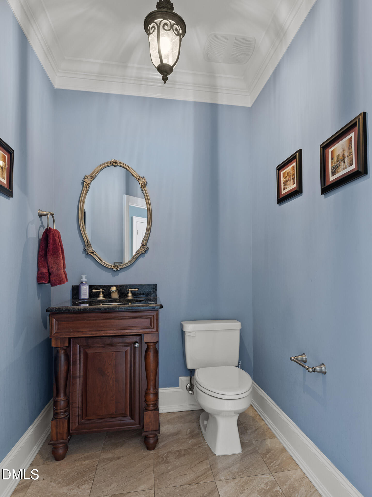 112 Winding Ridge Road Durham, NC 27713 - Photo 67 of 84 a living room with a toilet a sink and a mirror
