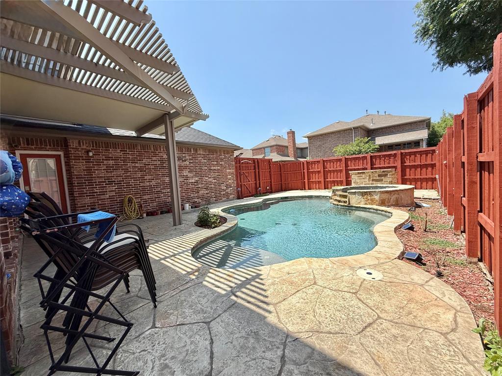 2754 Ridge View Road Frisco, TX 75034 - Photo 32 of 34 a view of swimming pool with outdoor seating