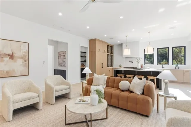 a bedroom with a bed and a couch