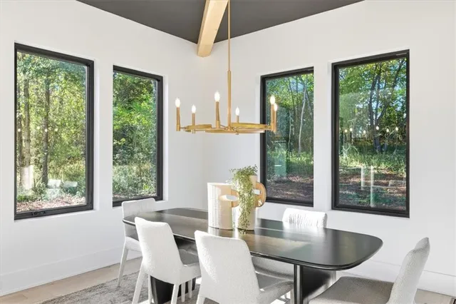 a view of a white house with a large windows