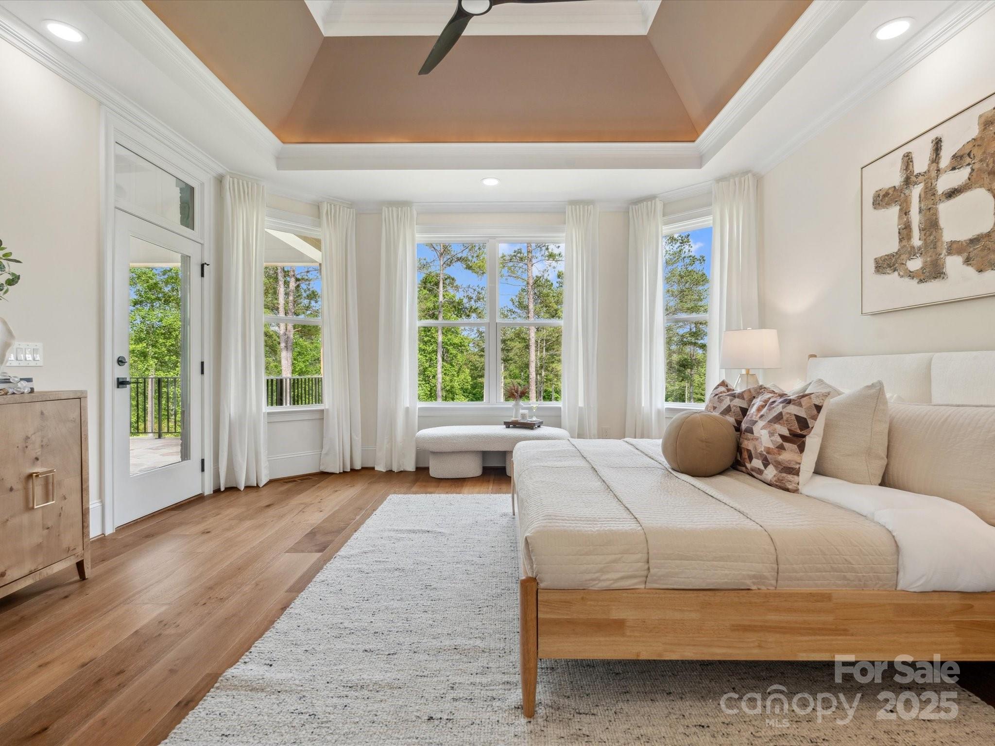 2024 Jumping Run Connelly Springs, NC 28612 - Photo 25 of 48 a bedroom with a large bed and a large window