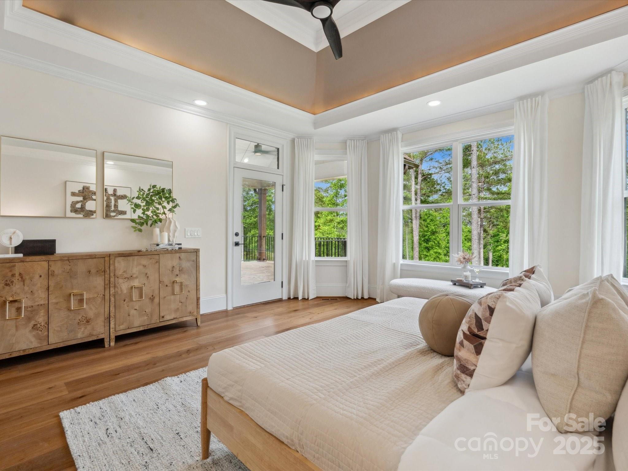 2024 Jumping Run Connelly Springs, NC 28612 - Photo 26 of 48 a spacious bedroom with a large bed and a dresser