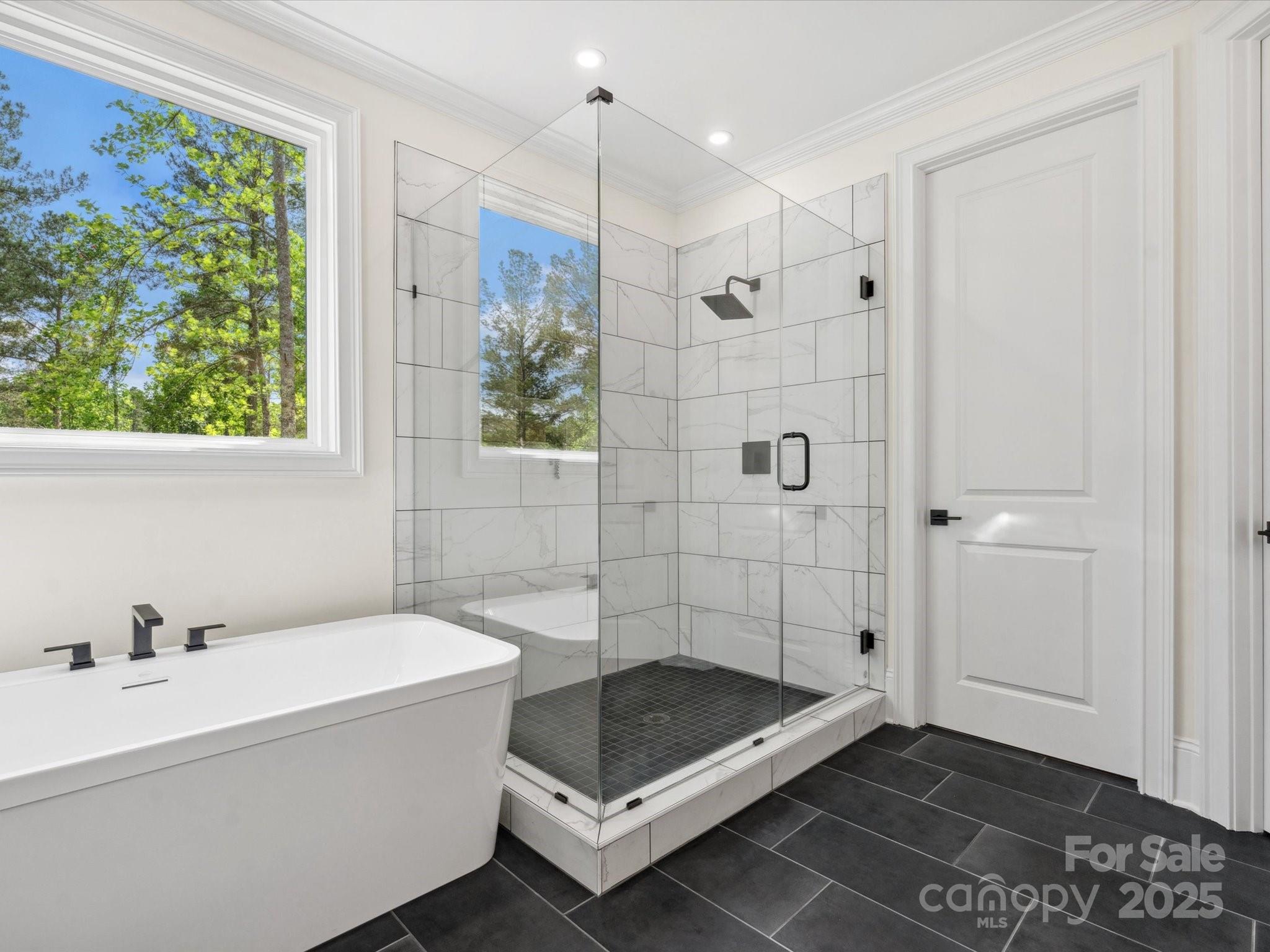 2024 Jumping Run Connelly Springs, NC 28612 - Photo 30 of 48 a bathroom with a tub a sink and shower