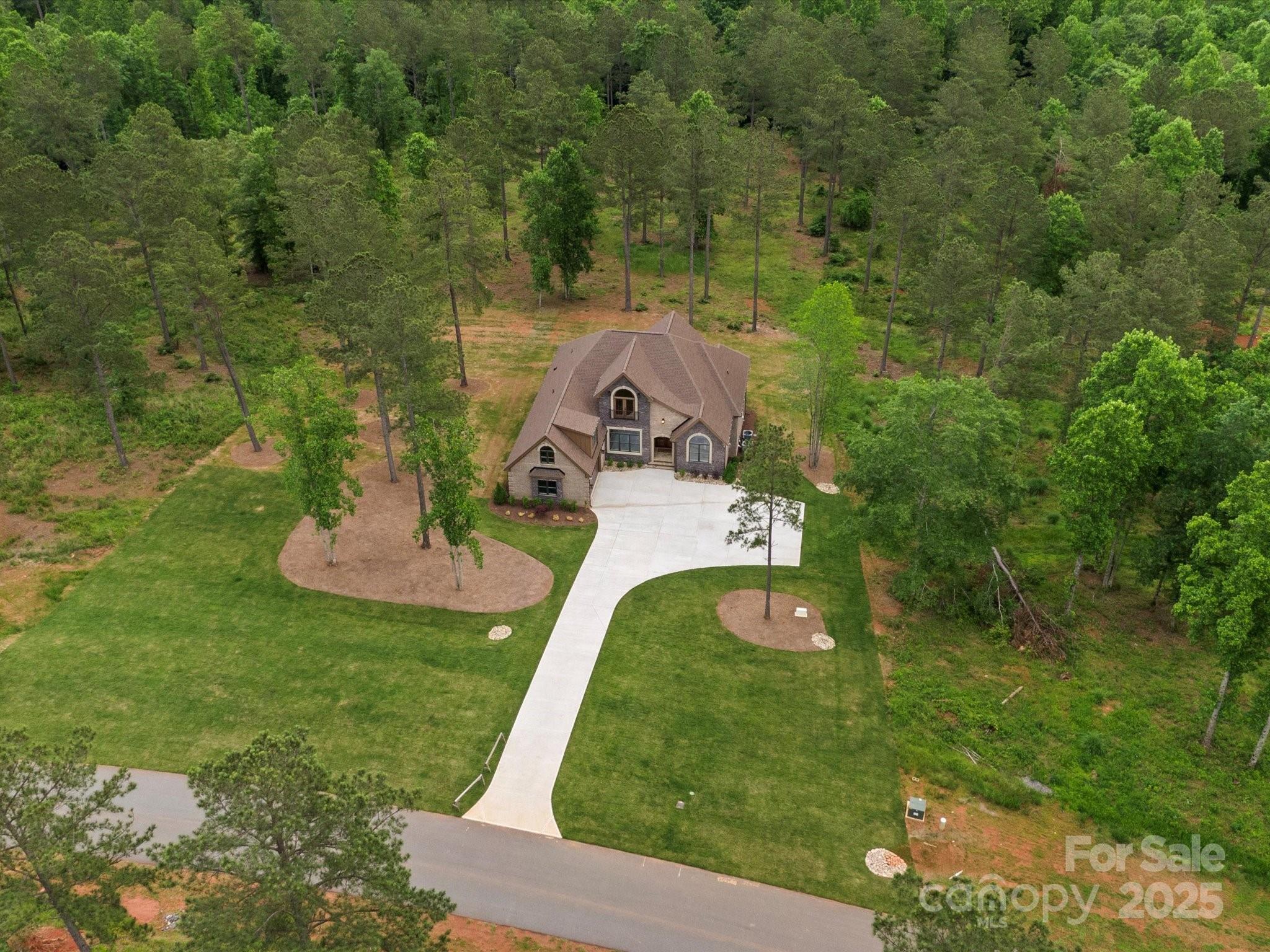 2024 Jumping Run Connelly Springs, NC 28612 - Photo 42 of 48 a view of a garden with a slide