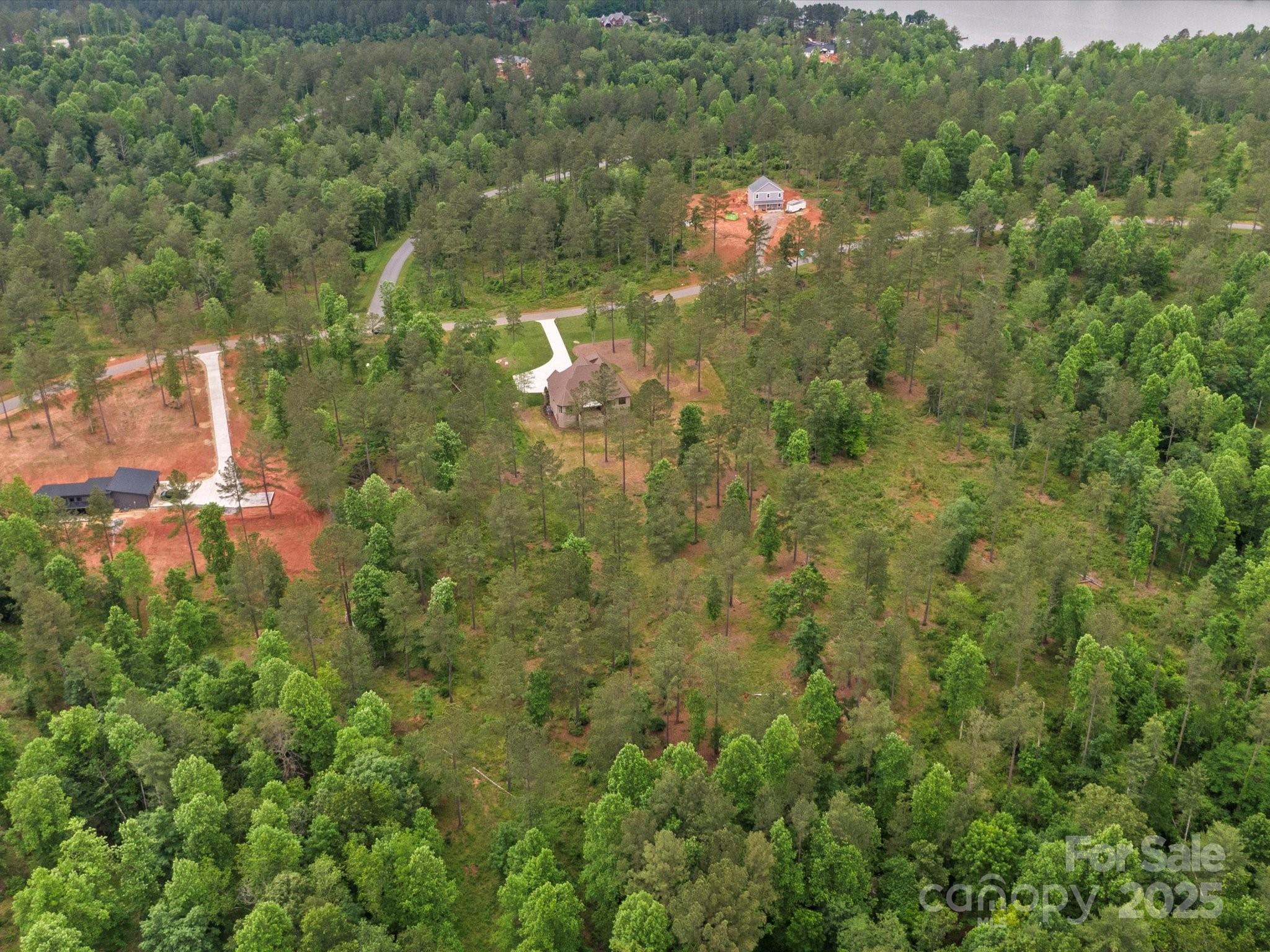 2024 Jumping Run Connelly Springs, NC 28612 - Photo 43 of 48 a view of a yard and basketball court
