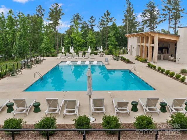 a view of a house with a swimming pool