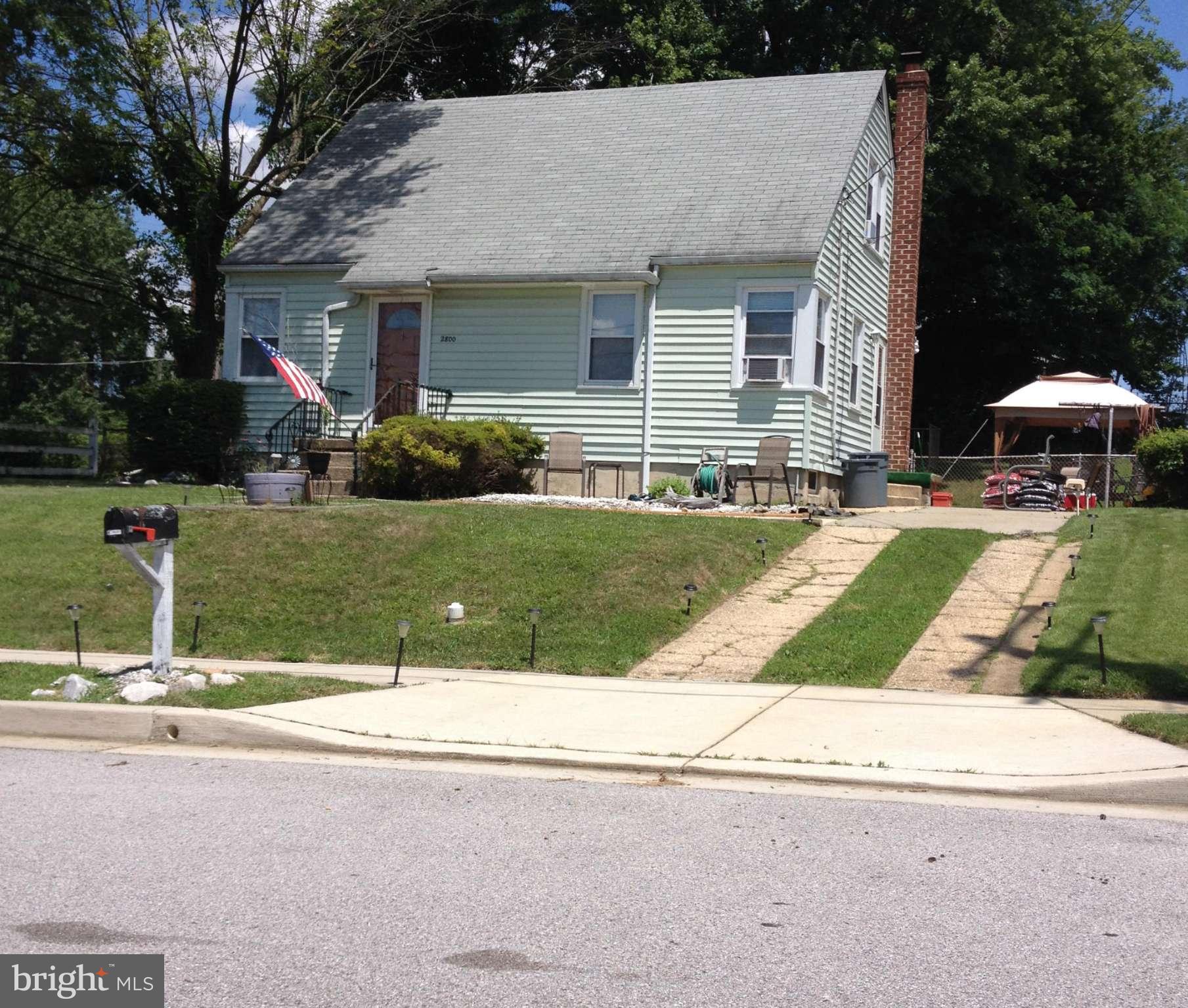2800 Manoff Road Halethorpe, MD 21227 - Photo 1 of 1 a front view of house with yard and green space