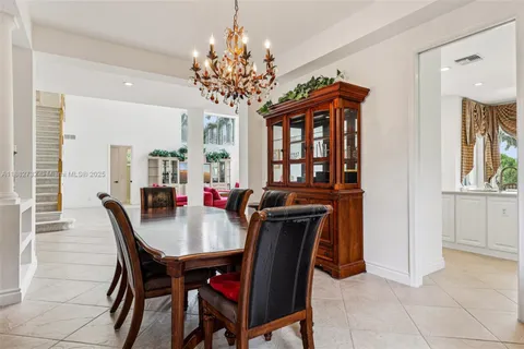 a view of a chairs and table in the patio